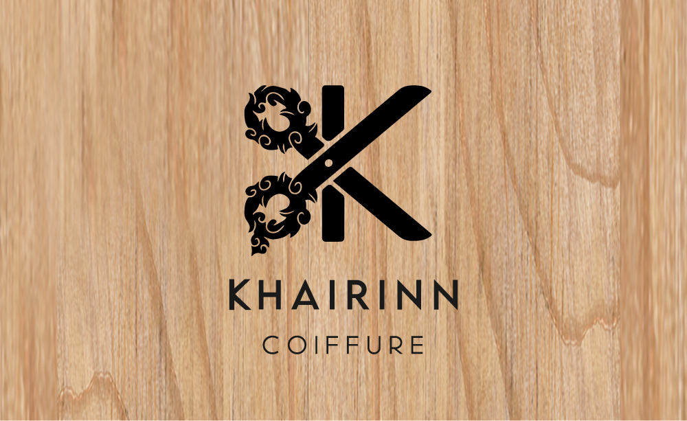 elea-design-portfolio-khairinn-coiffure-black-logo-wood-background